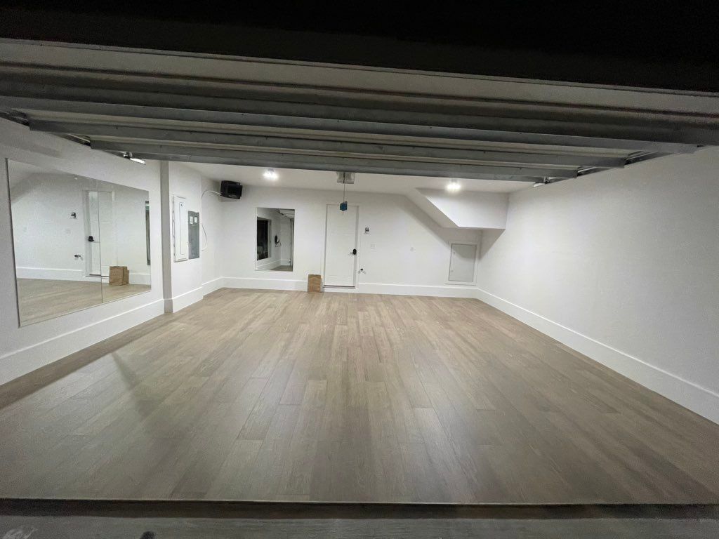 Garage  renovation. Installation of hardwood floor