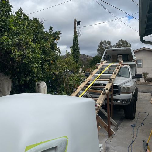 Lifting custom camper sleep pod on truck