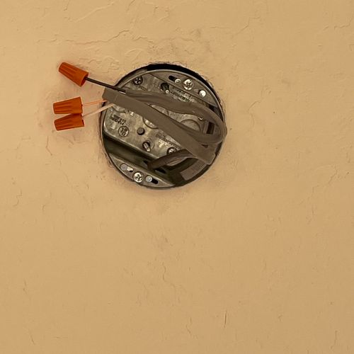 Ceiling fan junction box with 14-2 romex cable.