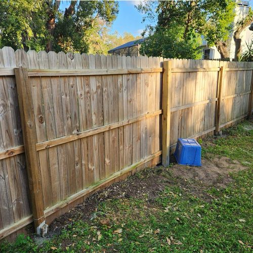 Fence repair. One new post and three sections were