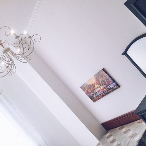 Andrii mounted a mirror on the wall in my apartmen