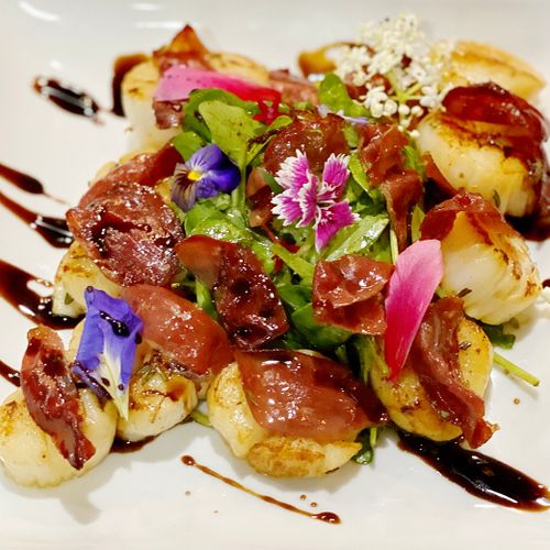 Scallops with Duck Prosciutto, edible flowers and 