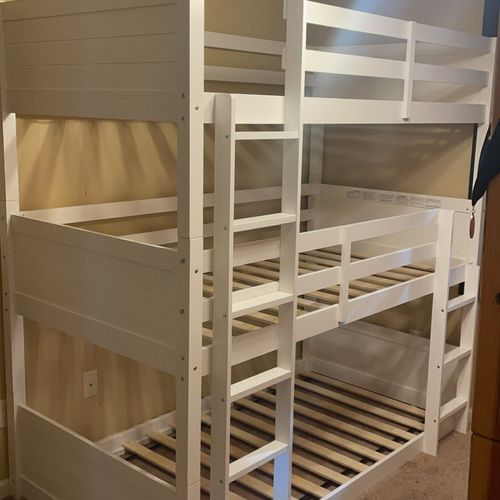 Triple bunk bed.