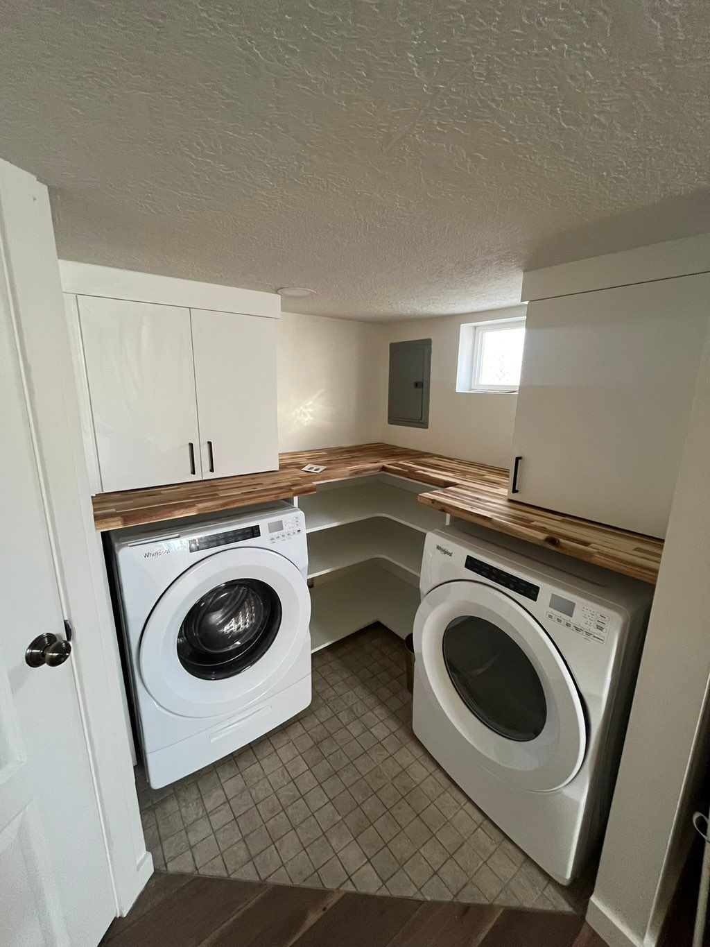 Designed and installed laundry room storage system