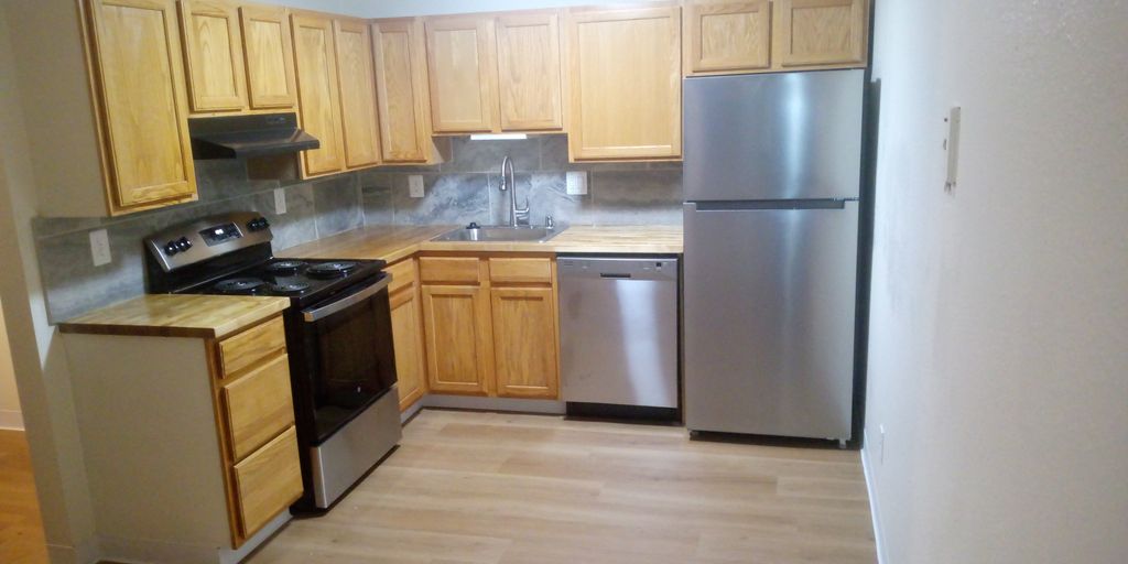 Saved owner $2,700 by fixing old cabinets instead 