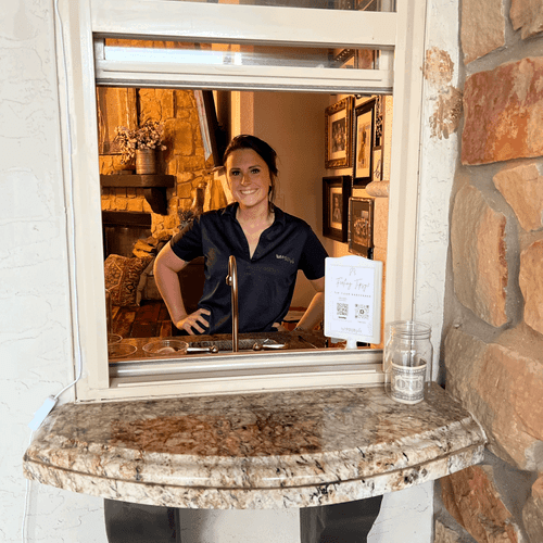 Bartender Lesly serving at a private home performa