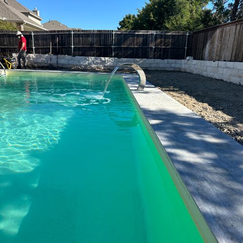 They built a very beautiful pool in my backyard. A