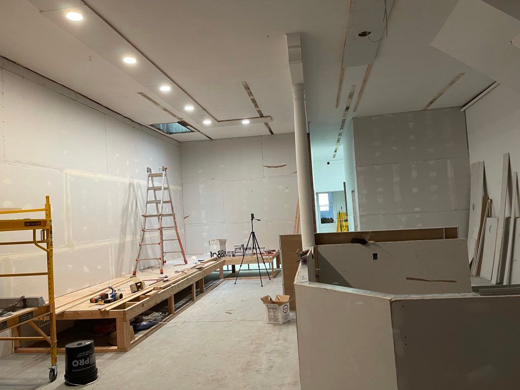 Drywall taping for smooth wall (level 4) finished.