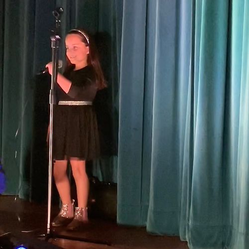 Natalie rocking it at Open Mic Night