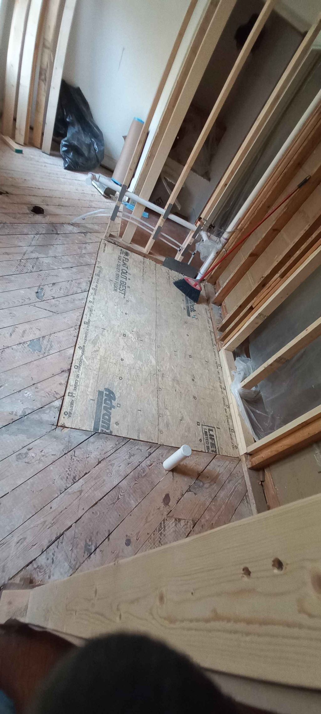 floor cleaned after rough in plumbing for master b