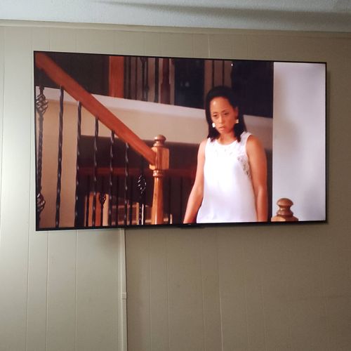 75 inch Flat screen TV wall mounted with wire conc