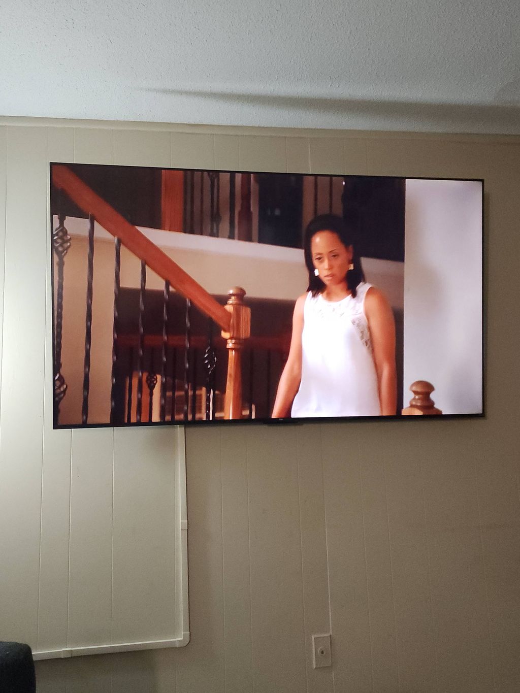 75 inch Flat screen TV wall mounted with wire conc