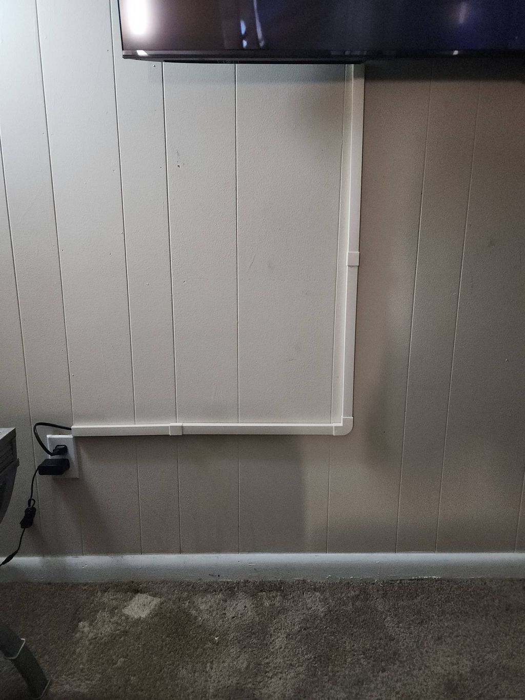 75 inch Flat screen TV wall mounted with wire conc