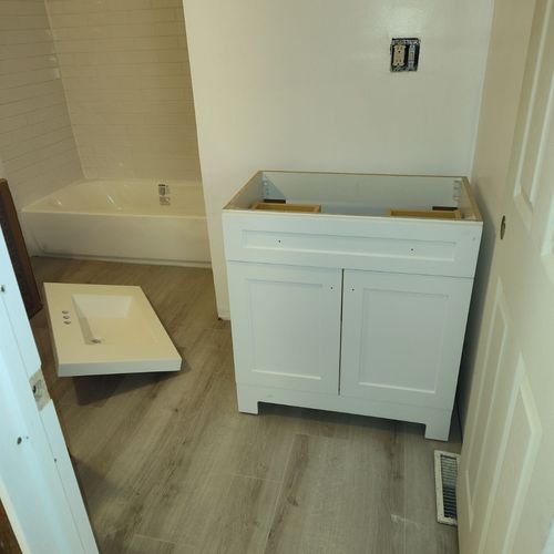 total Reno,new tub,vanity,floor and electrical 