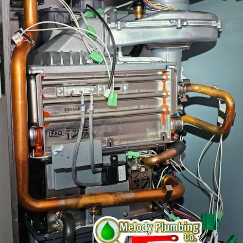 Inside view of a tankless water heater showcasing 