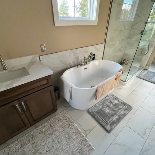 Customs shower with heated Ditra flooring and tile