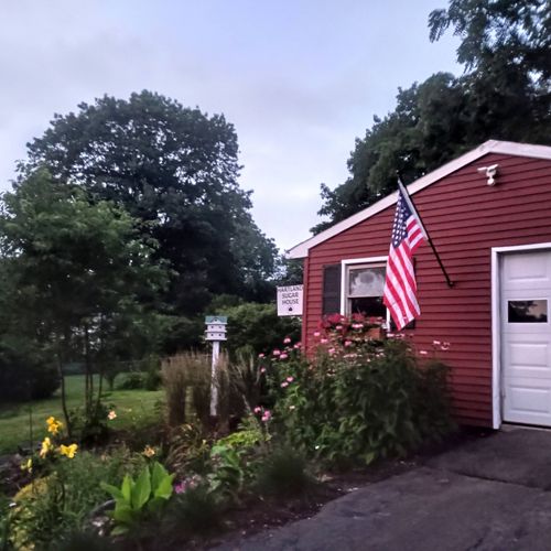 Painting of vinyl sided garage, perennial planting