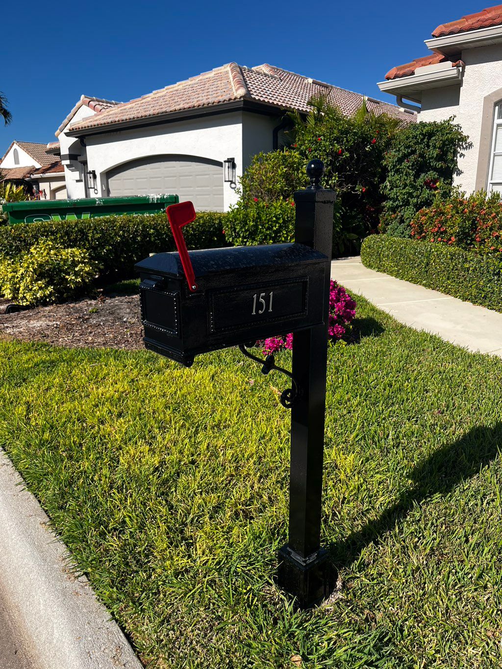 Sanded and painted 27 mailboxes for a home owners 