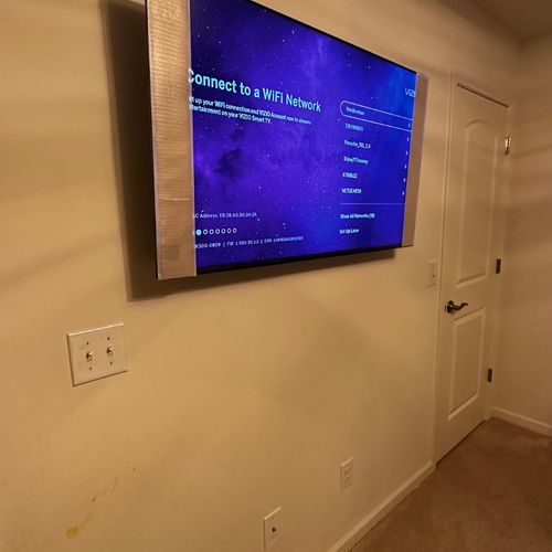 Nick did a great job hanging the TV on the wall. C