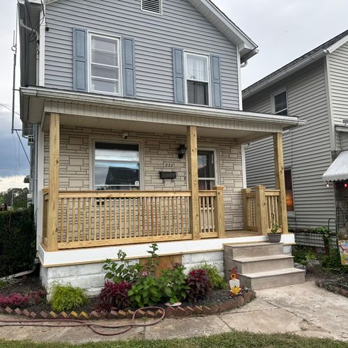 Brand new wood porch with pvc fascia boards and ne