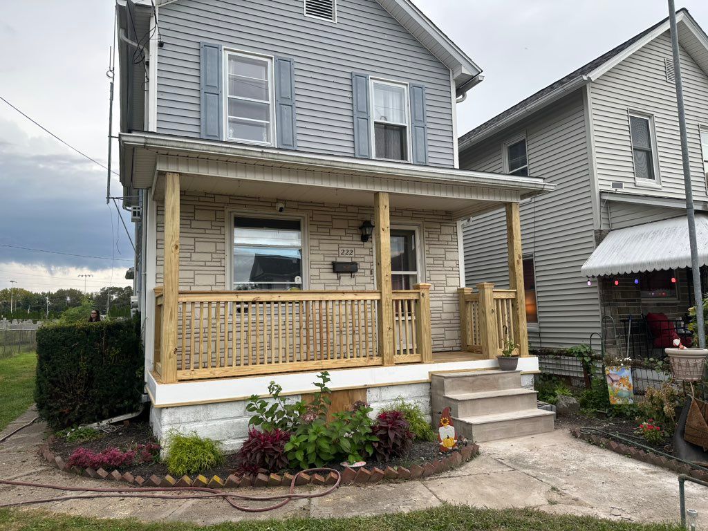 Brand new wood porch with pvc fascia boards and ne