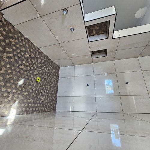 We hired ZL Modern Infrastructure LLC for a tile i