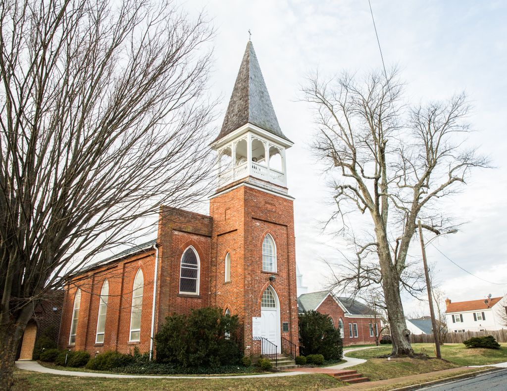 Cedar roofing on a historic church steeple. 