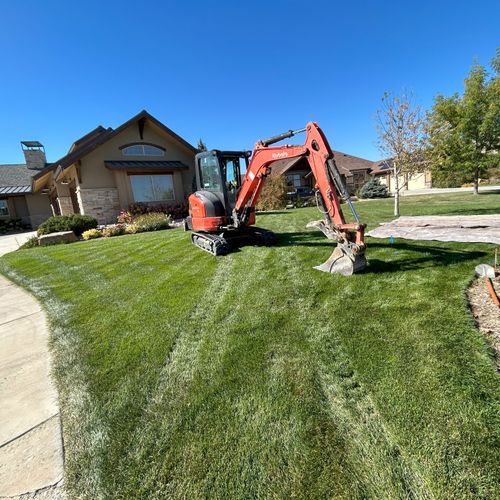 Excavator Digging Water Line