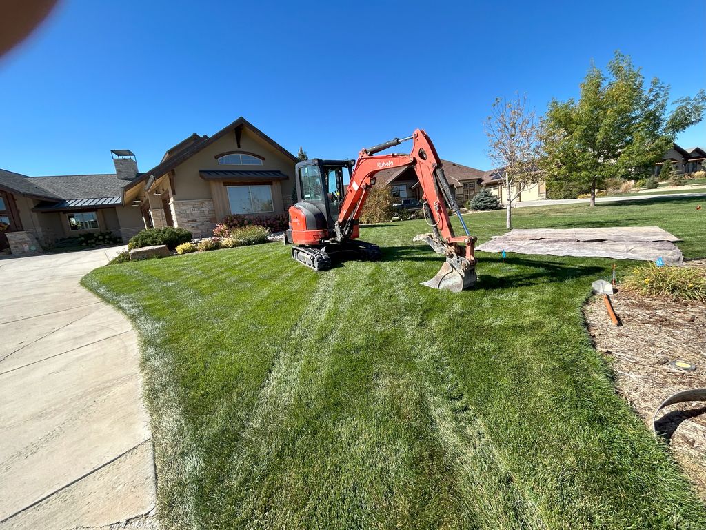 Excavator Digging Water Line