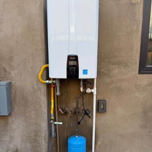 Installed a tankless water heater with a recircula