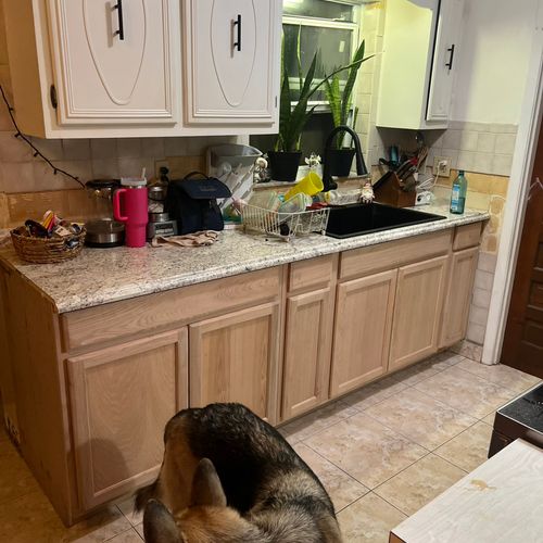 After: New Base Cabinets, countertop, and sink
