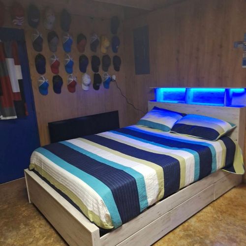 Fully assembled modern bed with LED lights, chargi