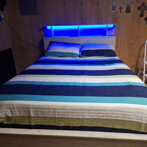 Fully assembled modern bed with LED lights, chargi