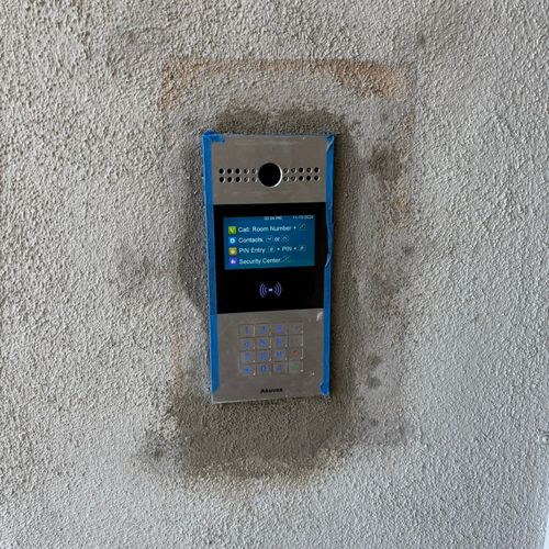 Recessed phone box installation and stucco patchin