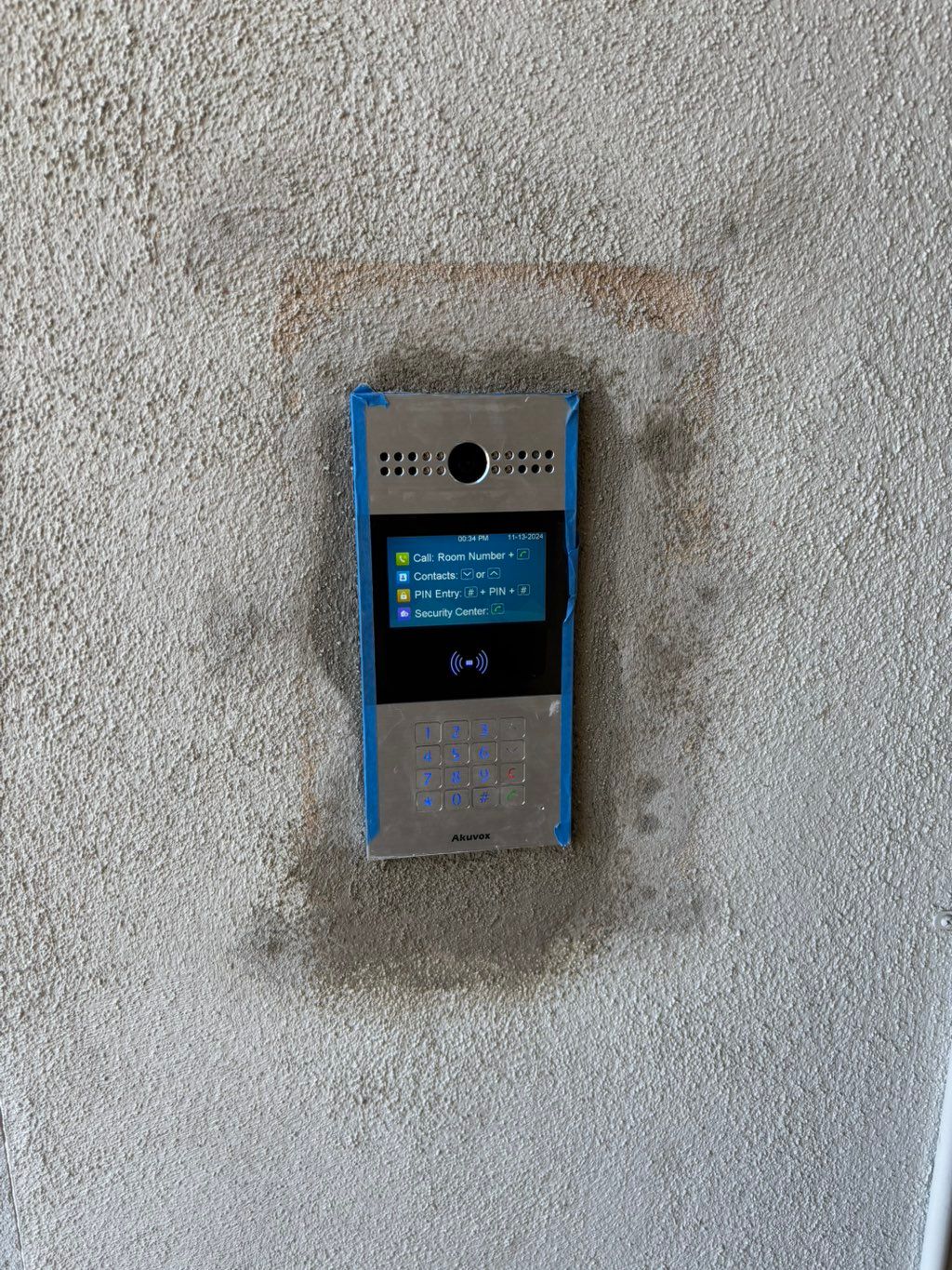 Recessed phone box installation and stucco patchin