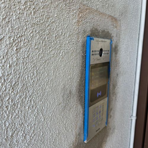 Recessed phone box installation and stucco patchin