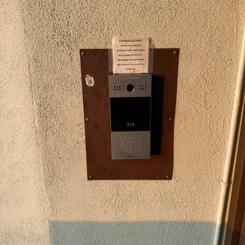 Recessed phone box installation and stucco patchin