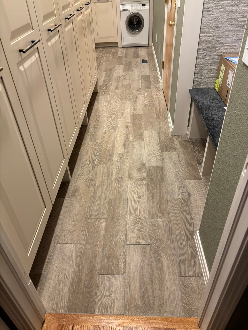 After fixing grout and loose tiles