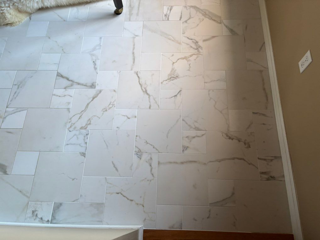 After fixing the grout and tiles that were loose