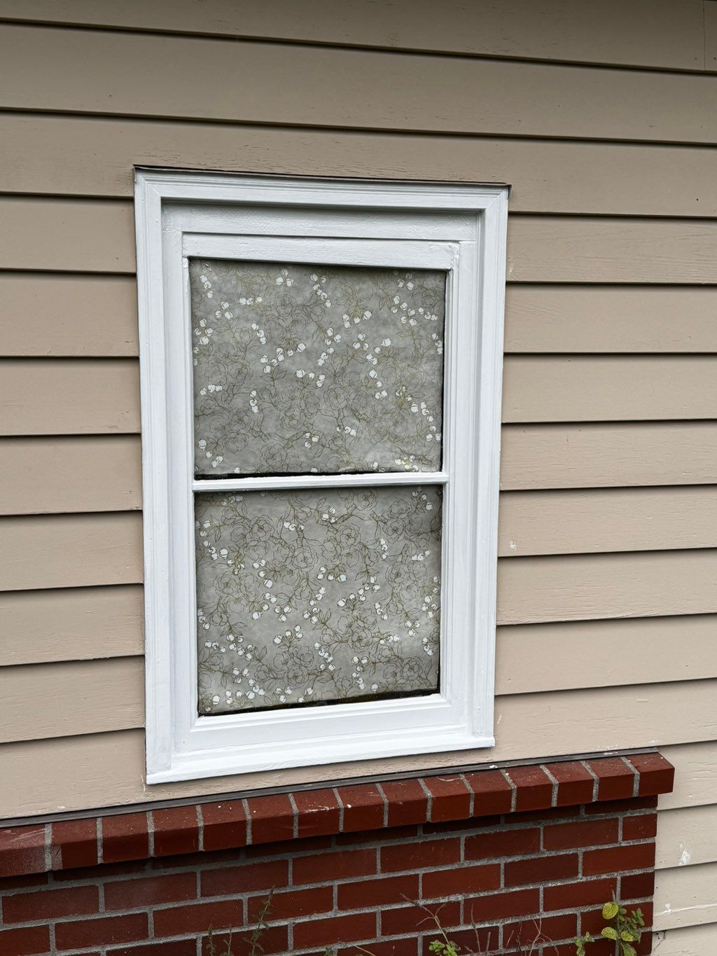 Second of two rotted windows fixed and primed, rea