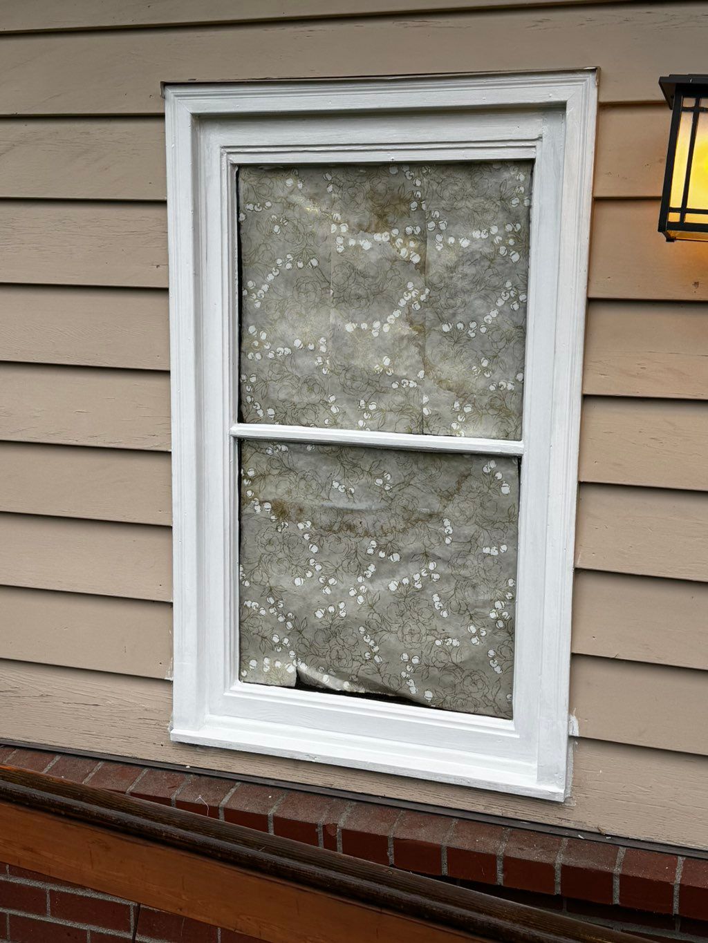 One of two rotted windows fixed and primed, ready 