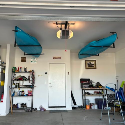 Professionally installed ceiling mounted Kayak rac