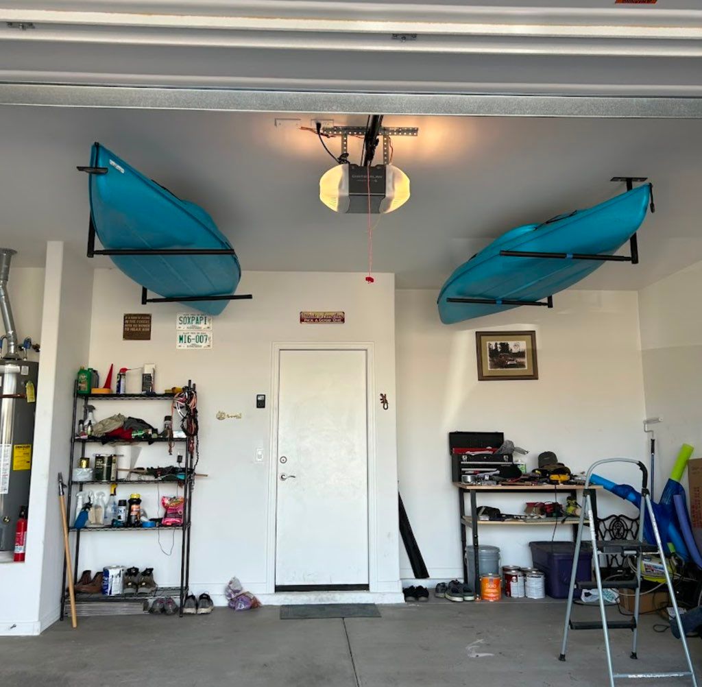 Professionally installed ceiling mounted Kayak rac