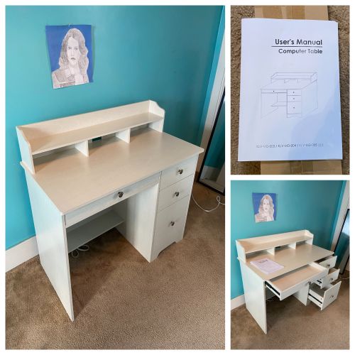 Assembly of a computer desk