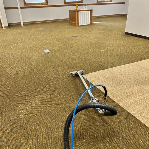 Cleaning carpet for city of Bentonville in remodel