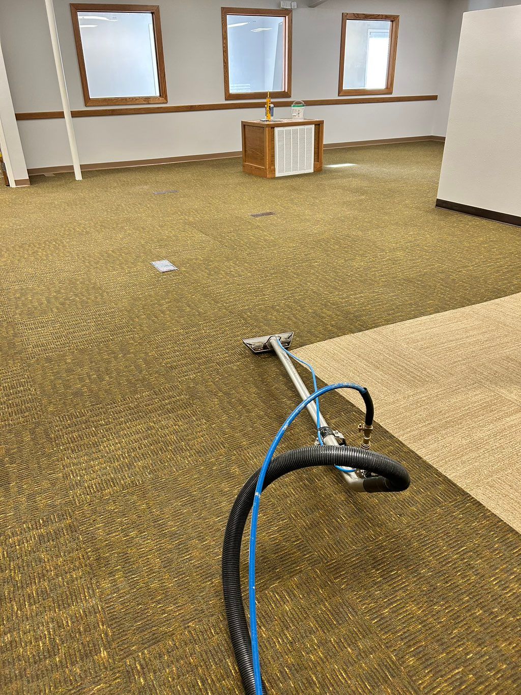 Cleaning carpet for city of Bentonville in remodel