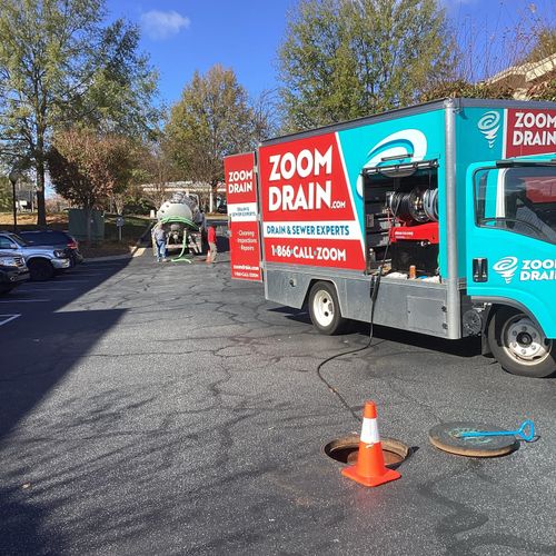 Hydrojetting heavy grease buildup in sewer for a G