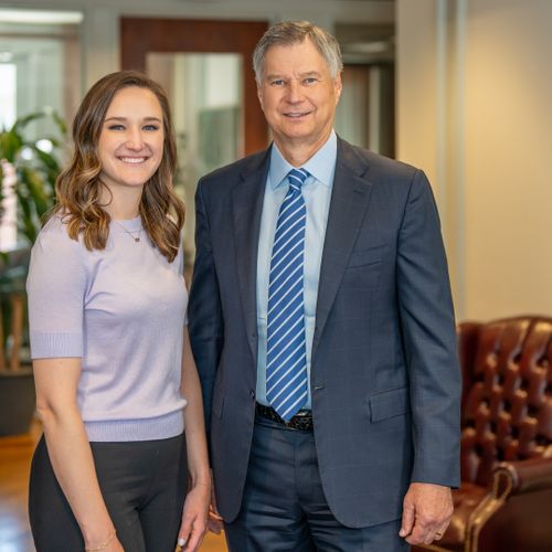 Gene Riddle (managing partner) and his daughter, A