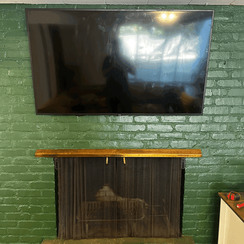 65 inch TV mounting on a brick wall