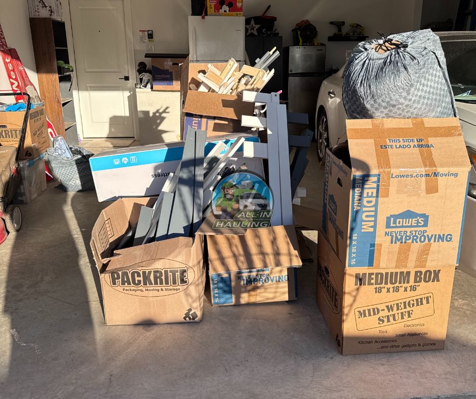 Moving boxes garage clean out in Willis.